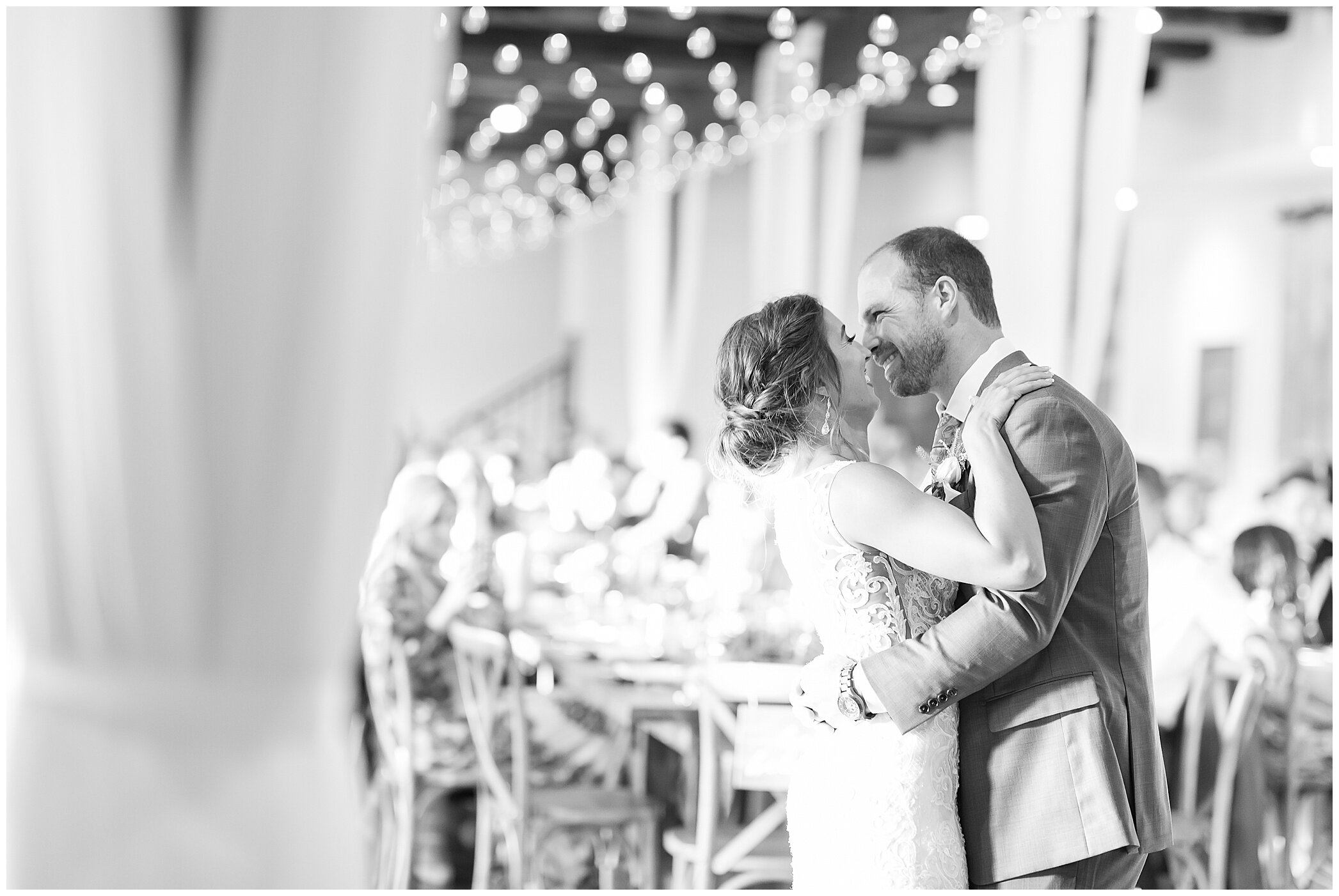 bride and groom kiss during first dance at Granary at Valley Pike