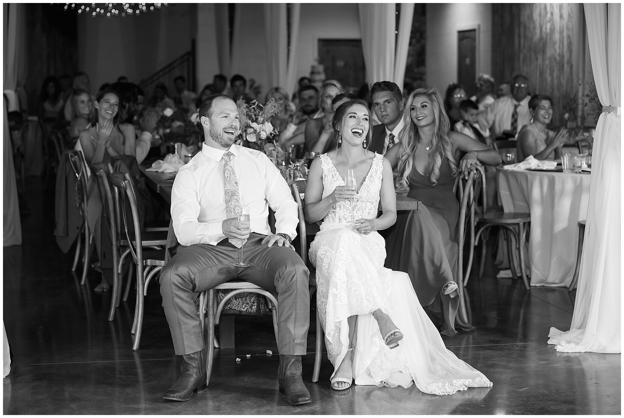newlyweds listen to toasts during Granary at Valley Pike reception