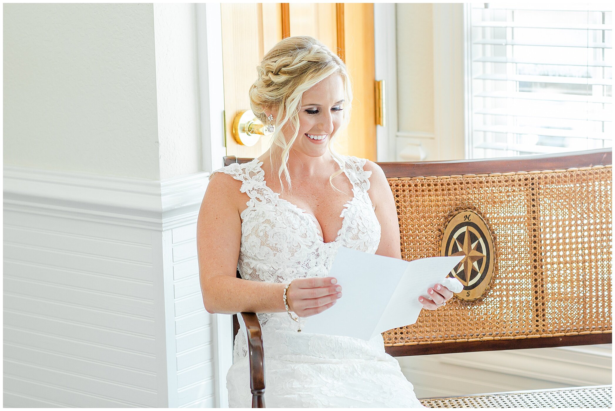 bride opens a letter from groom on wedding day