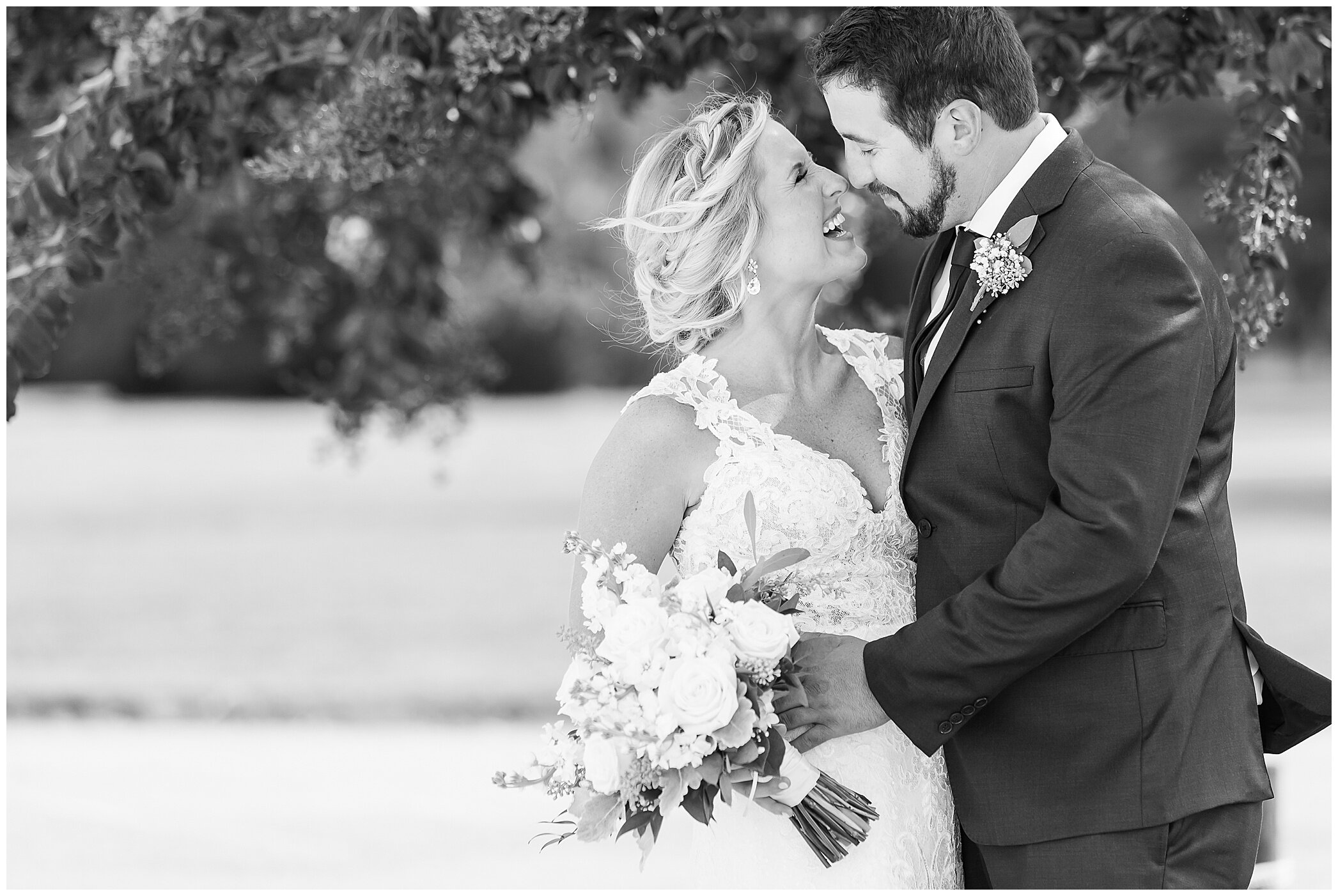 newlyweds laugh during VA wedding photos