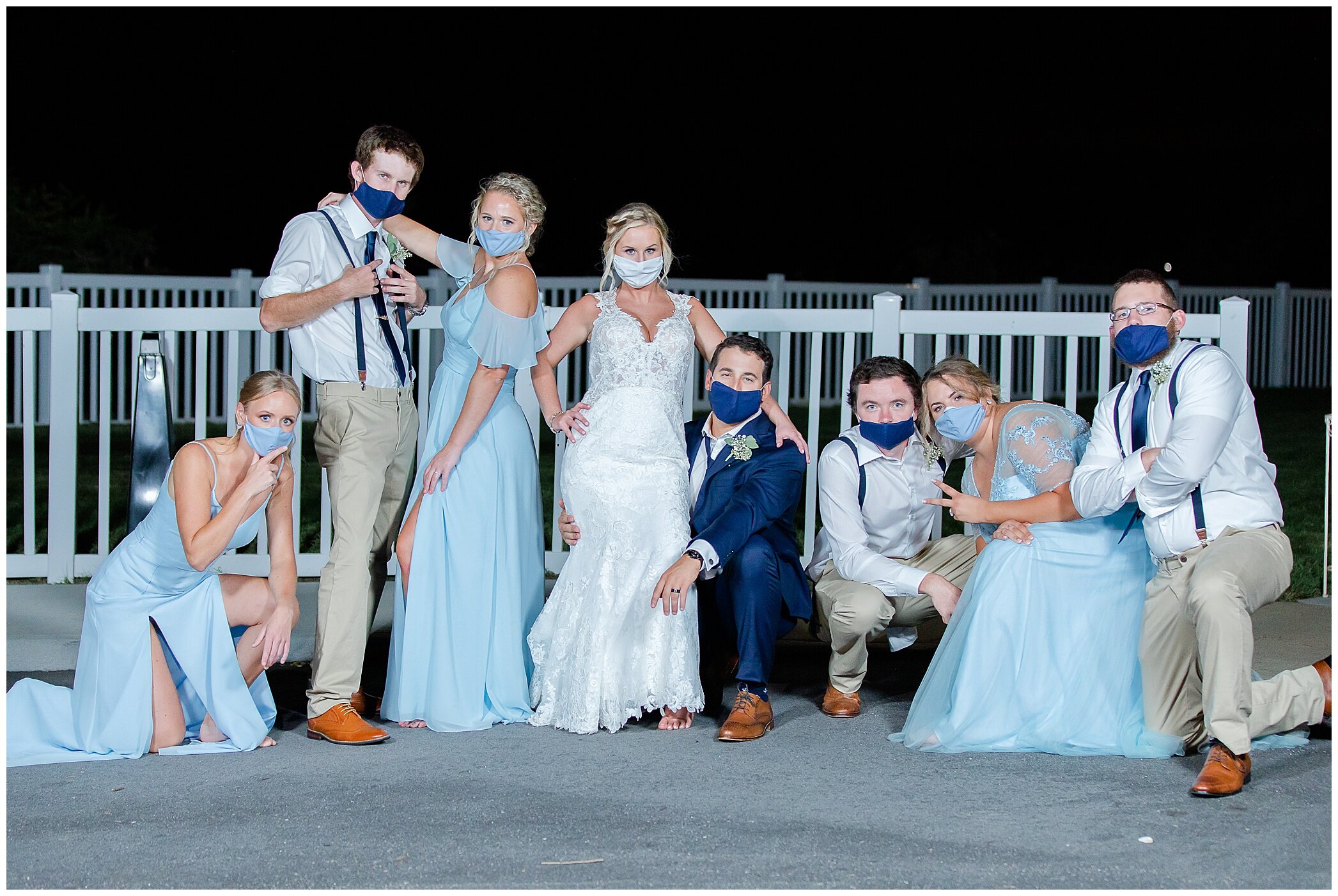 bridal party poses in masks at Planter's Club