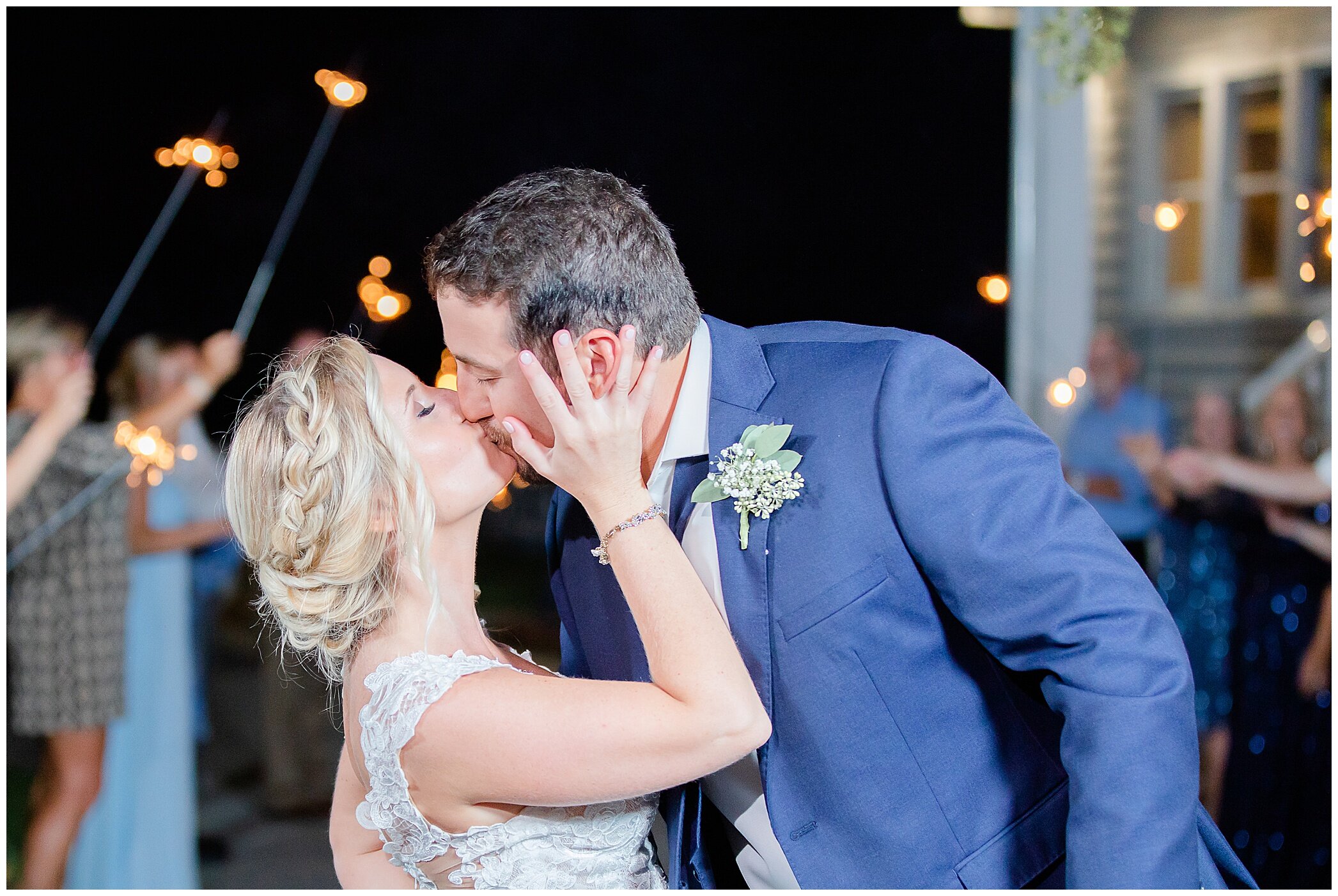 newlyweds kiss during sparkler exit at Planter's Club