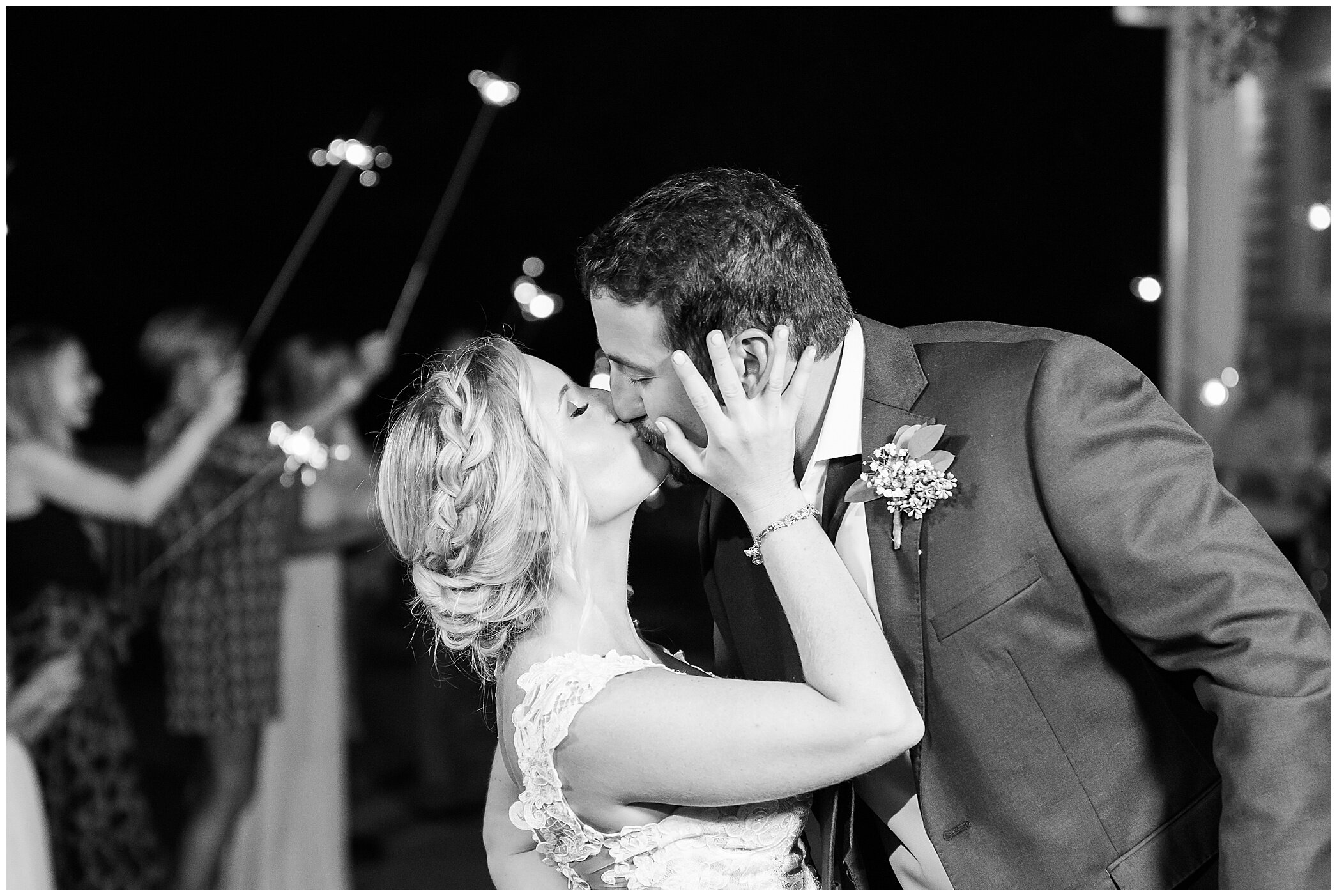 bride and groom kiss after Planter's Club wedding exit