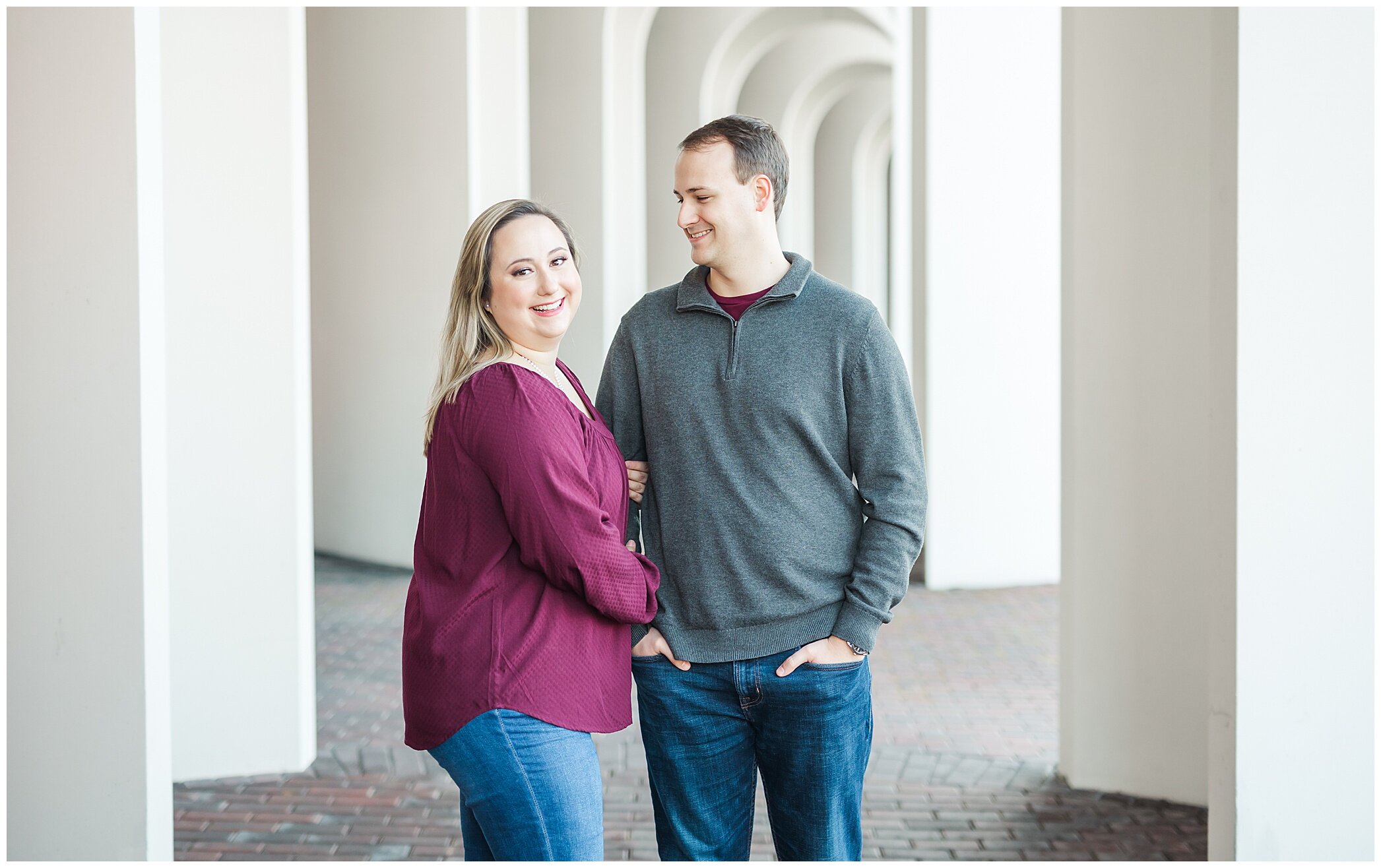 bride and groom pose together at Christopher Newport University