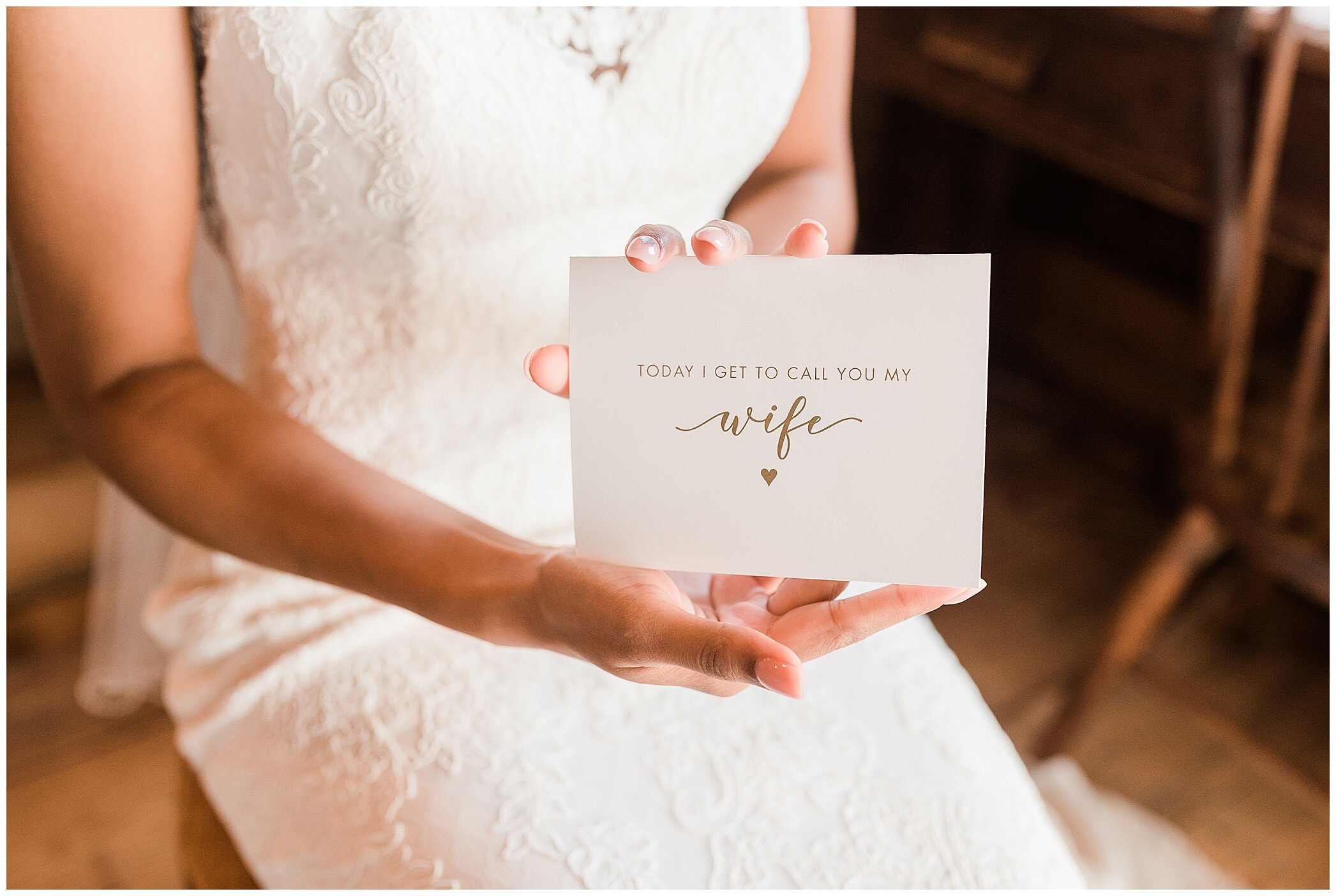 bride opens card from groom on wedding day in VA