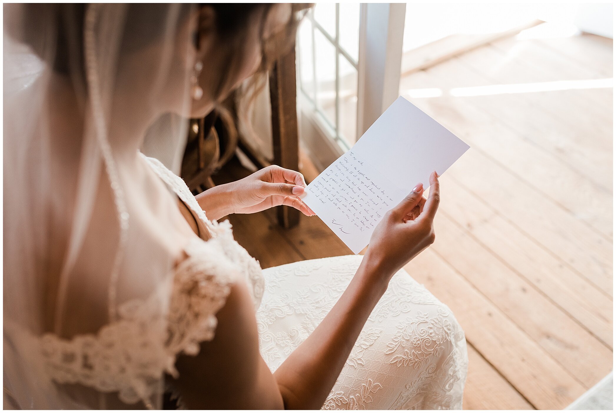 bride reads letter from groom during Barns at Timberneck wedding day