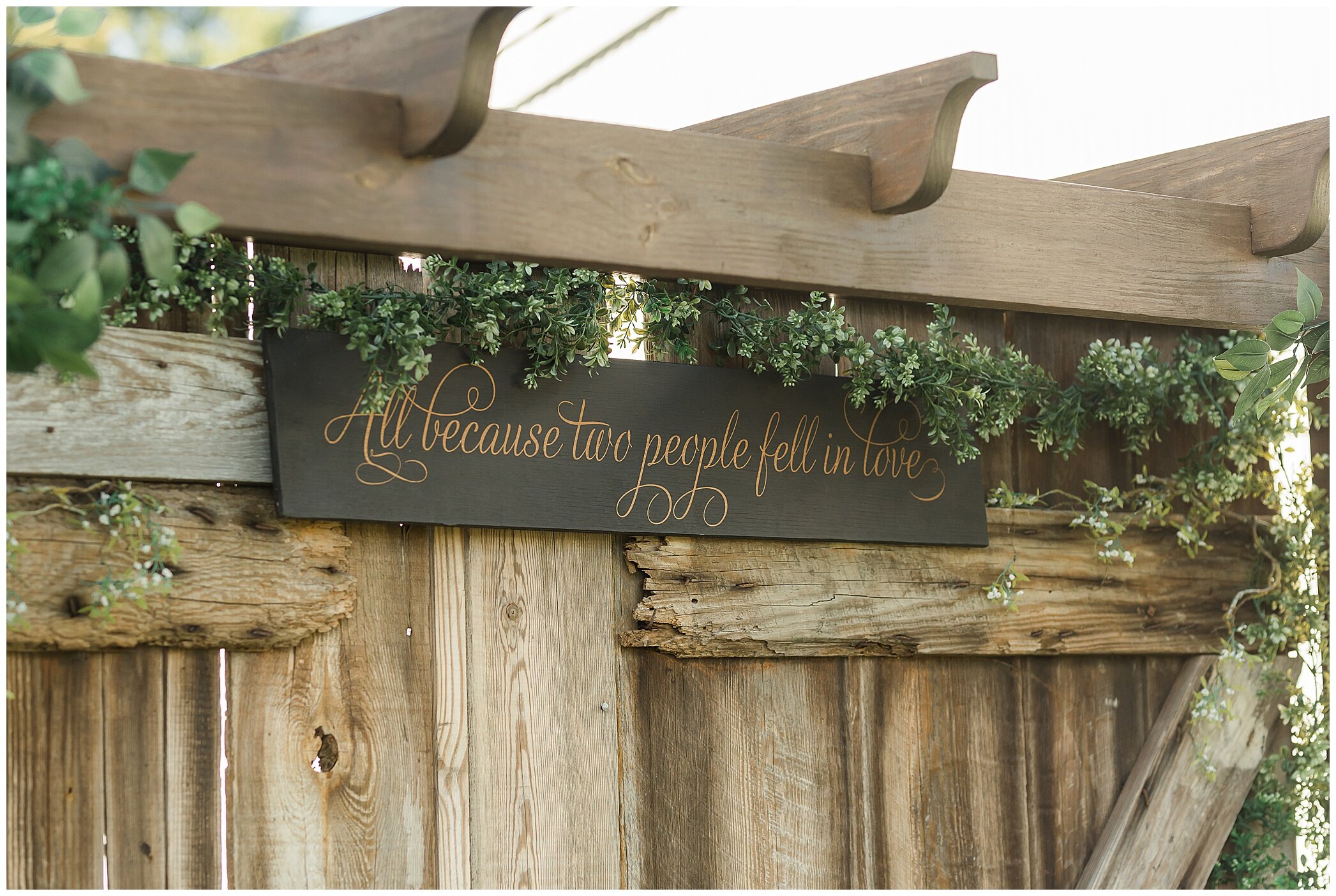 custom sign above altar for outdoor ceremony at The Barns at Timberneck