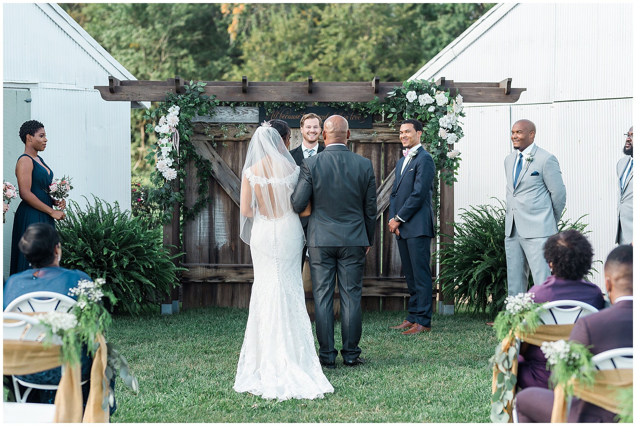 father gives bride away to groom during VA wedding ceremony
