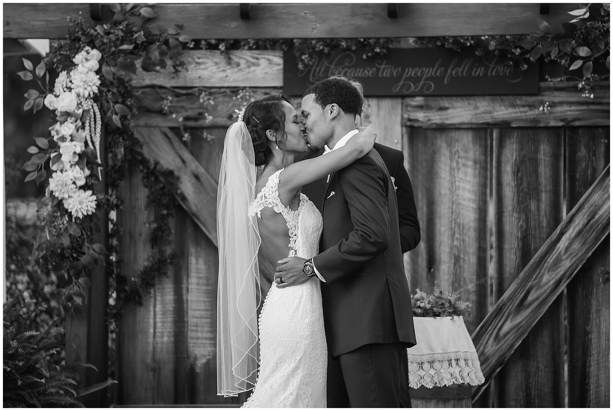 bride and groom kiss at Surry VA rustic wedding venue