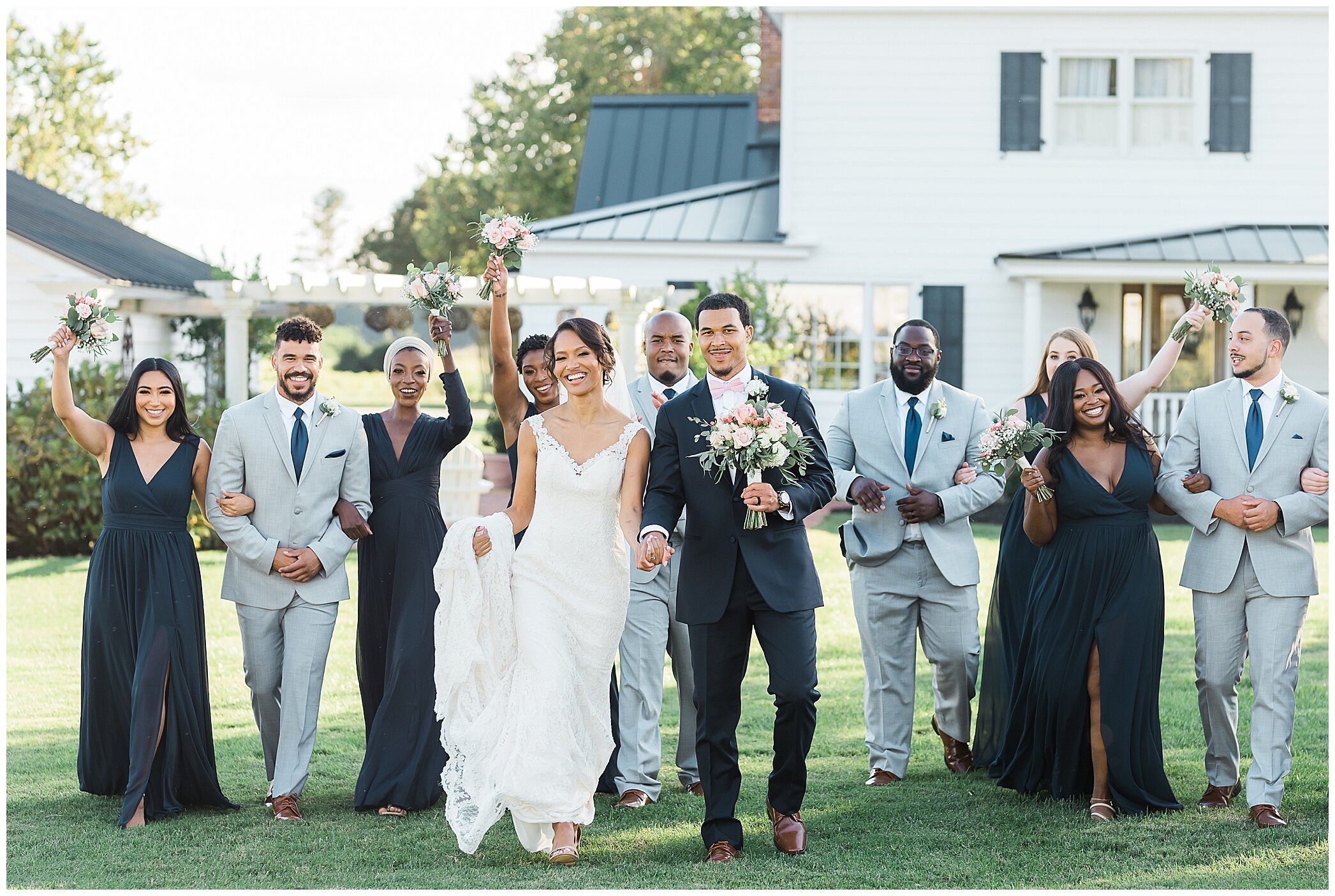 bride and groom walk with bridesmaids in teal gowns and groomsmen in grey suits at The Barns at Timberneck