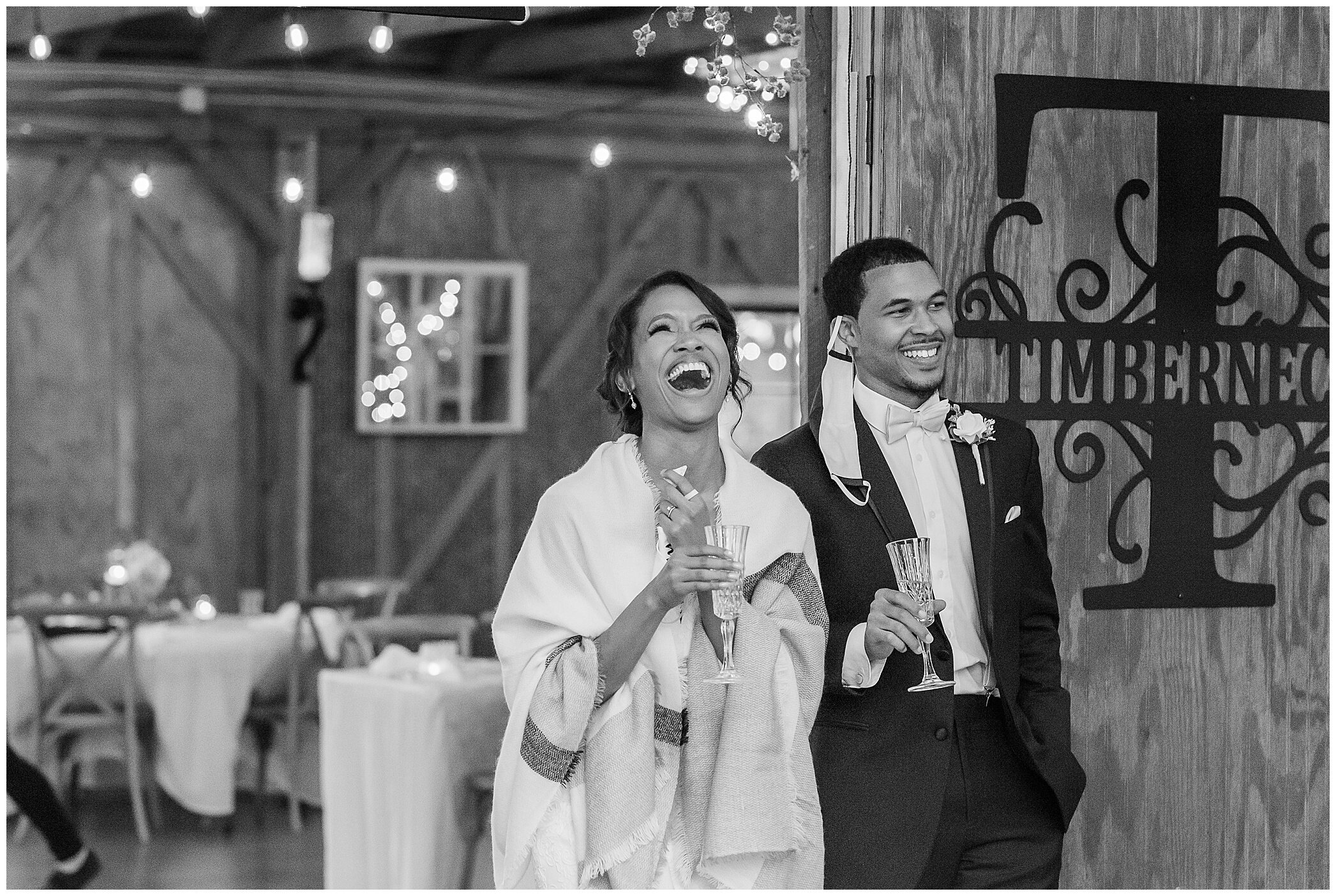newlyweds laugh during VA wedding reception