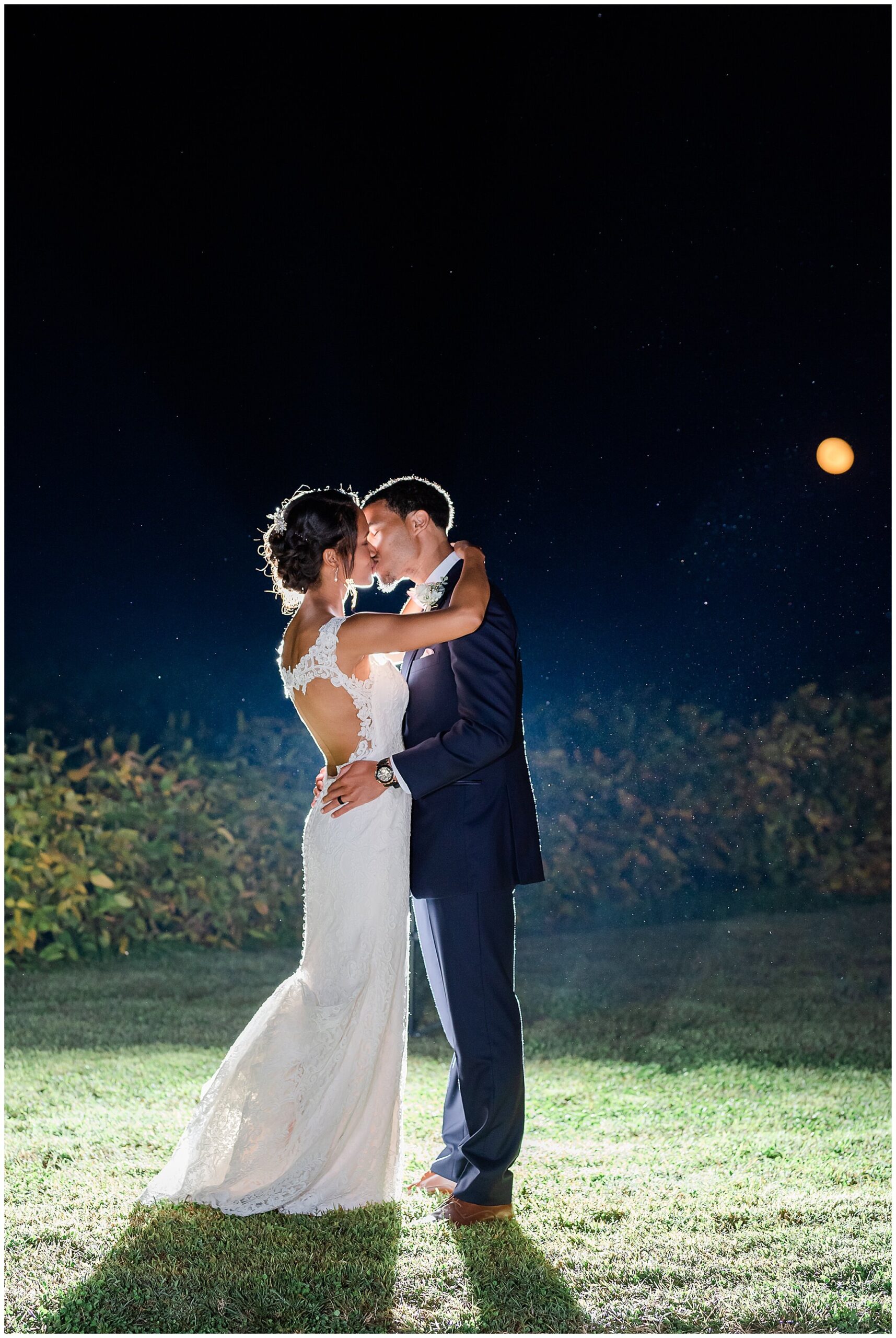 nighttime wedding portrait at The Barns at Timberneck